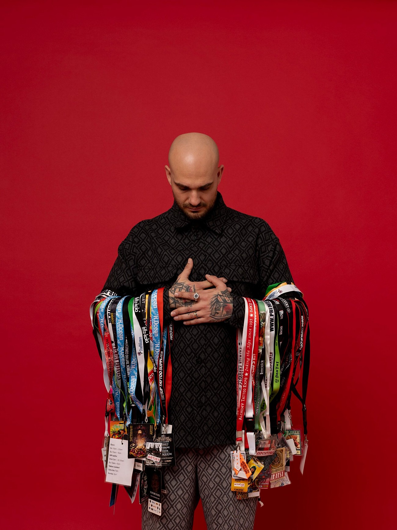 Penny Boy — Massimiliano Pennella wearing 100+ tattoo convention award medals
